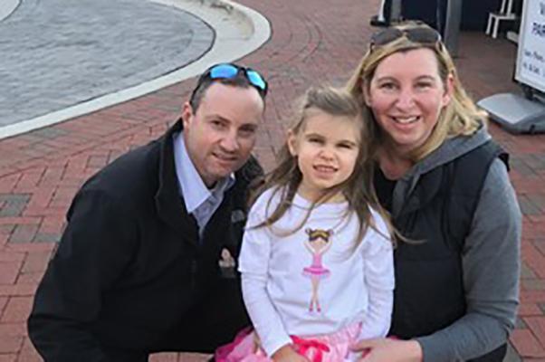 Parrish Henderson pictured with his wife, Amy, and daughter, Annabelle. 